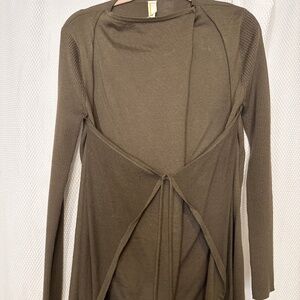 Very unique sweater with different flaps it’s fun